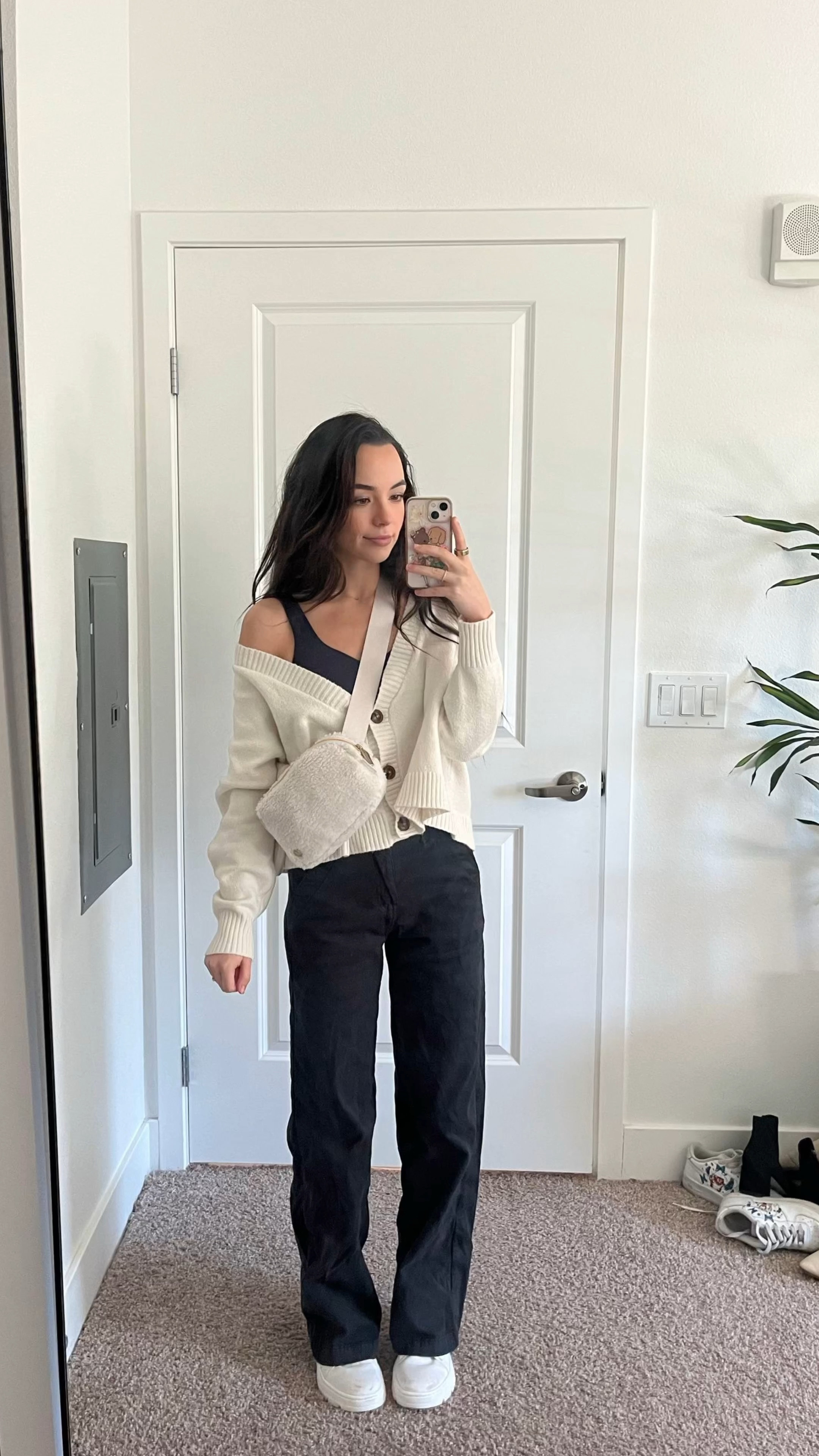 Outfit of the day!! Cozy fall/winter vibes with this one ❄️ gosh I could say so much about this outfit but 1.) the boots I’m wearing I’ve had for years! They’re dr martens so definitely a good purchase that lasts you long. 2.) new pants are big enough to layer leggings under if you need extra warmth and they’re comfy to wear! 3.) the lulu lemon bag is iconic and the fuzzy white is perfect for winter! Love that it matches basically everything I wear and it’s cozy ♡ 

#LTKGiftGuide #LTKCyberWeek #LTKVideo