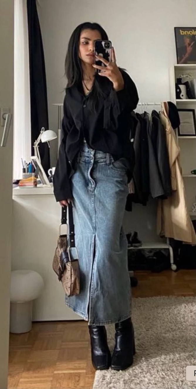 Elevated casual outfit featuring a black button-down, denim midi skirt, and black boots, perfect for chic everyday style and effortless outfit ideas.
Style tip: mix classic staples like denim and a tailored shirt for a timeless look, keep your color palette neutral, and add structured footwear like boots to instantly elevate your outfit. 

 #LTKootd