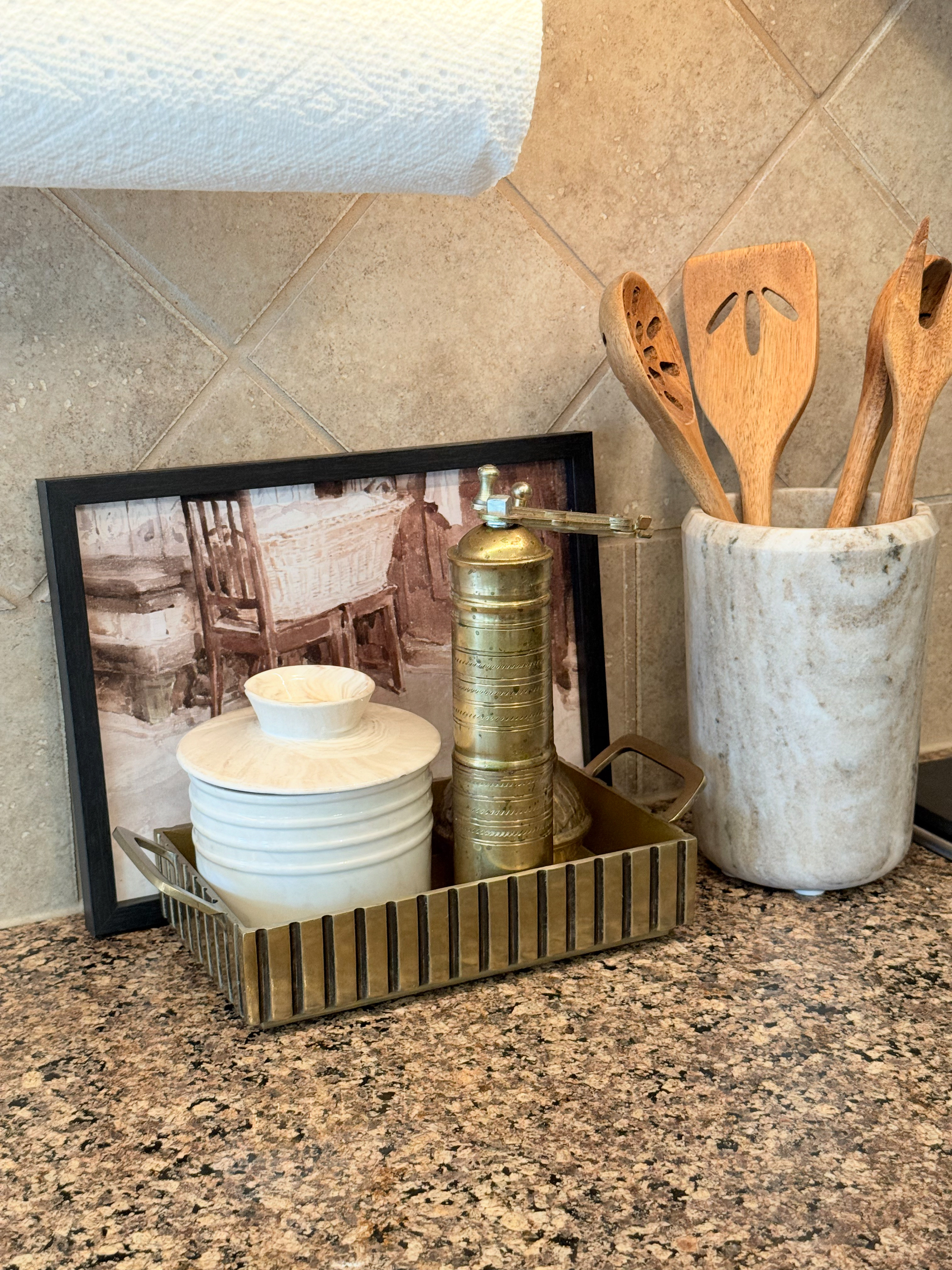 Achieving a curated kitchen look by grouping functional essentials like this brass mill and marble crock. 

 #LTKfoodie #LTKHome