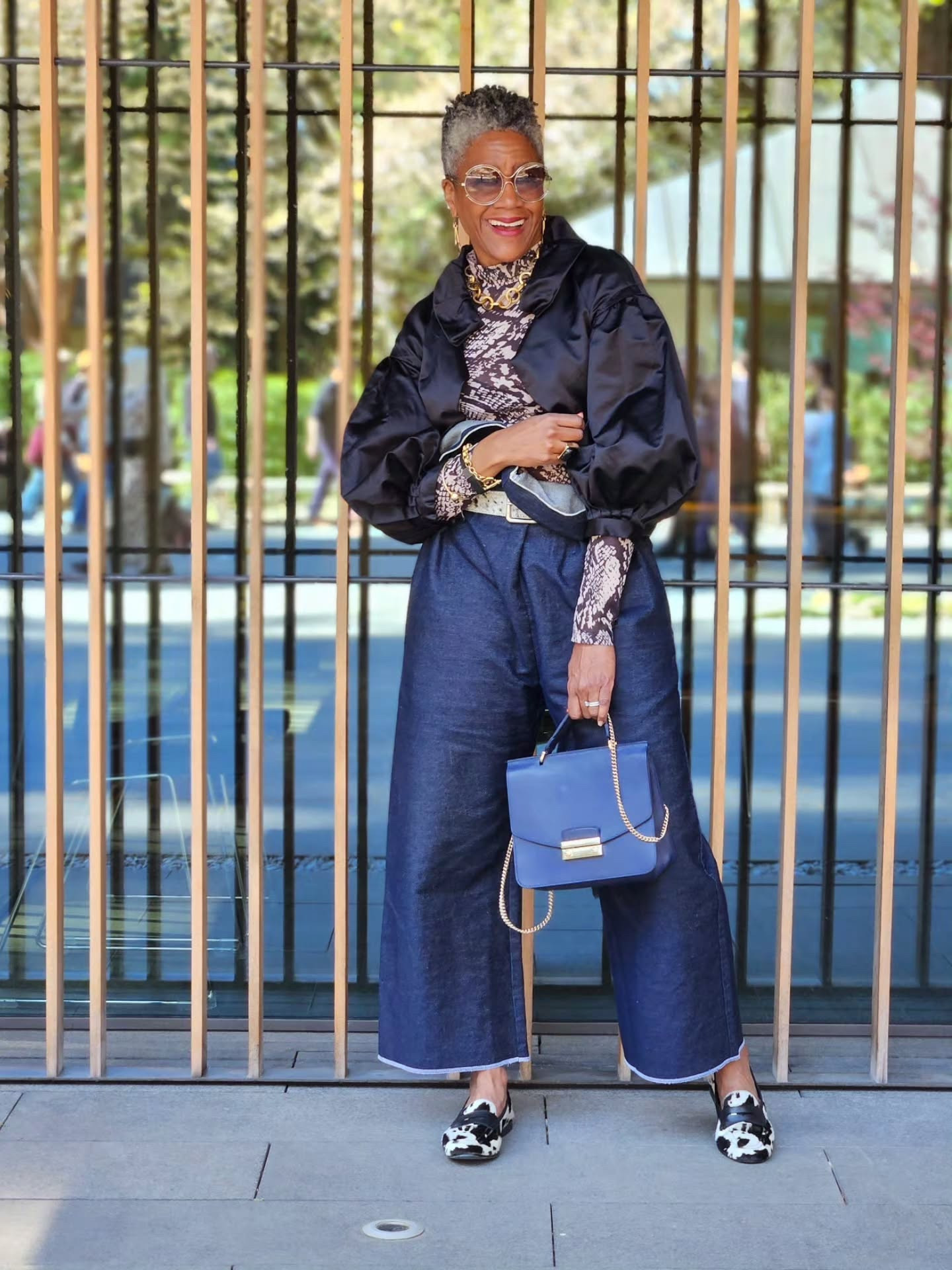 Style tips:

Different animal prints, but same tones. Two cows 🐄, one snake 🐍 
High waist pants + crop jacket
Mix silhouettes 
Ditch the self belt, and add a "real" belt