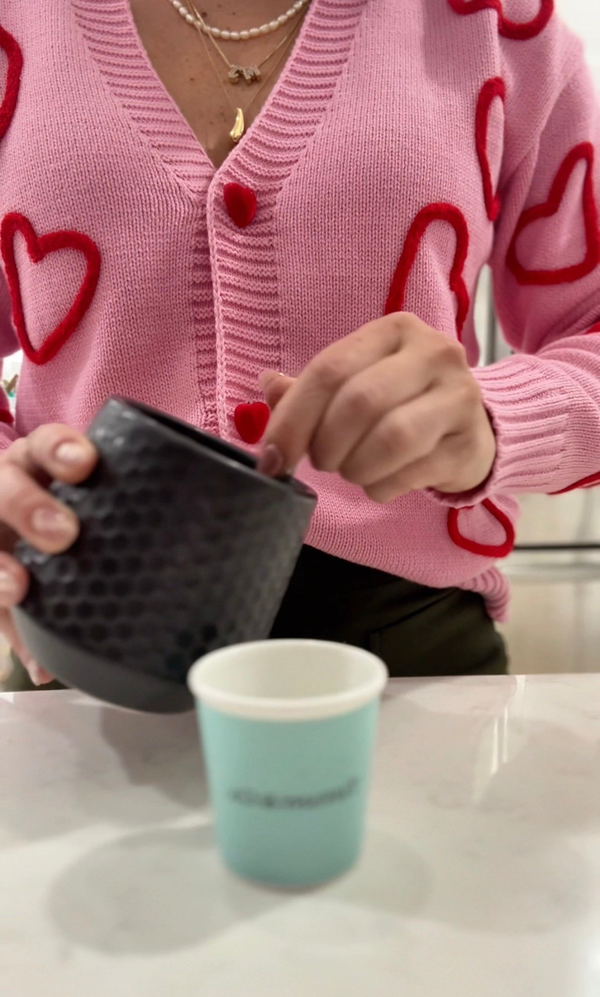 Afternoon cafecito with a side of heart cardigan from Target