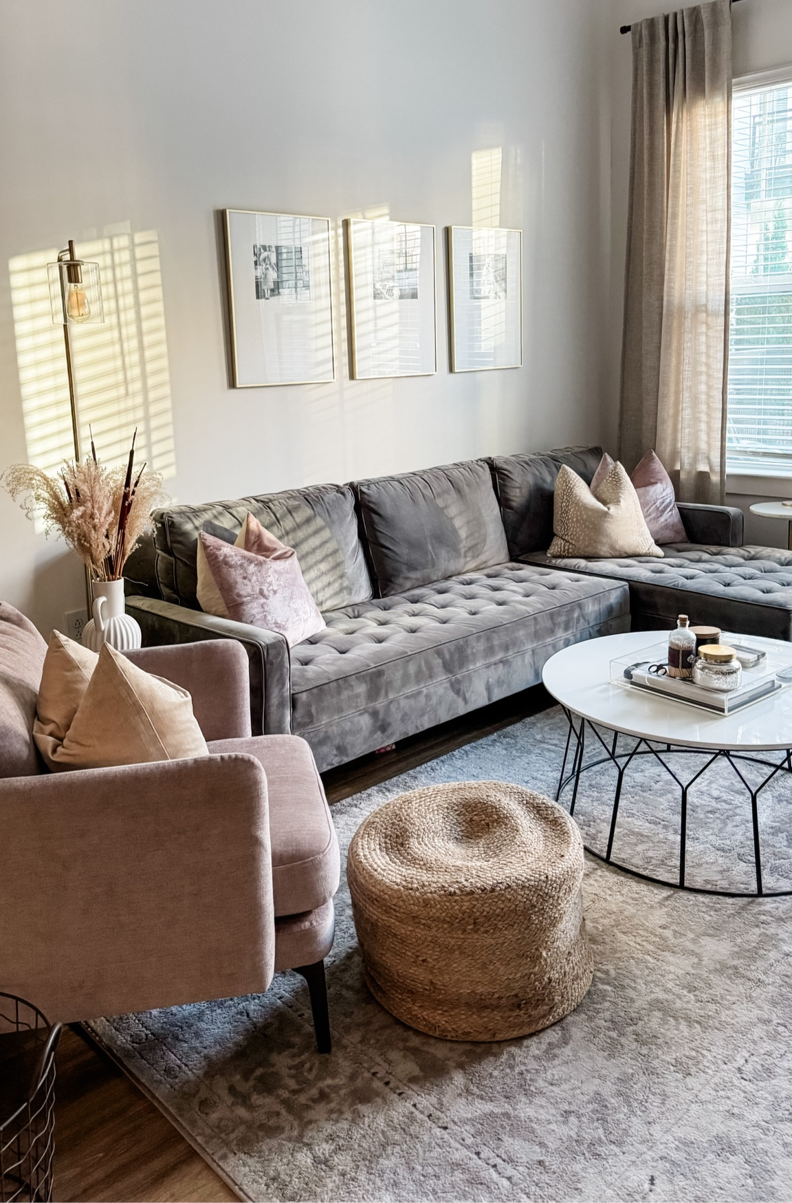 My living room: timeless neutrals with subtle pops of blush. My sofa is from Zgallerie and my frames have custom matting inside. 

#LTKSaleAlert #LTKFindsUnder100 #LTKHome