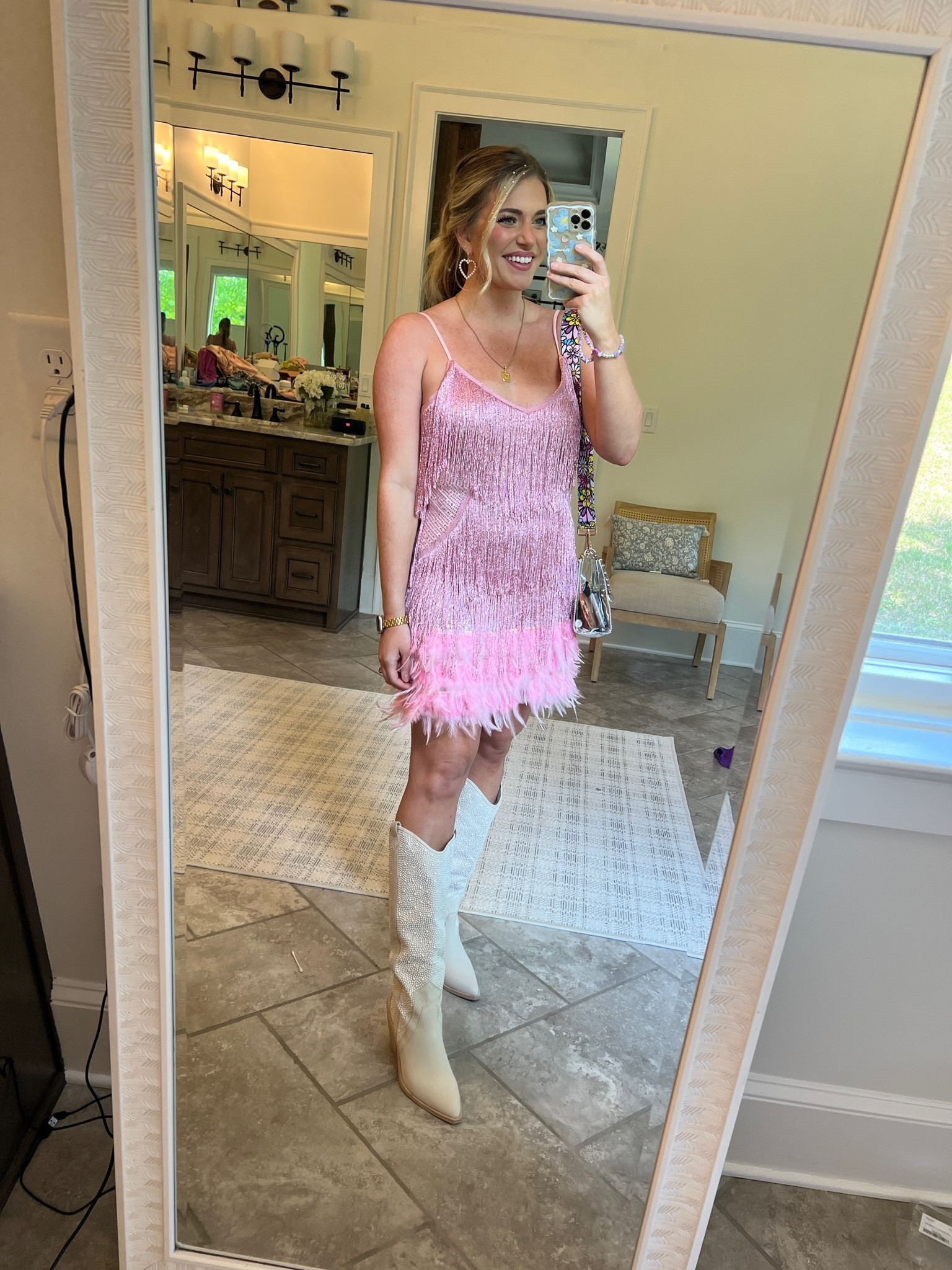 Taylor swift eras concert outfit. 😍💗✨ 

Pink tassel dress with sequins - sized up 1 to the L 
Pearl Boots sized up 1 - so comfy!!
Clear crossbody bag with flower bag strap from amazon 
Bejewels from craft section at target and glued them on w eyelash glue 


Amazon concert outfit prime  tswift eras tour outfit 


GRWM for the Taylor Swift Eras Tour concert tonight! 🤩💗 Can’t believe it’s finally here!! Seriously so freaking excited. Had to go with the pink because it’s just 🫶🏼 Linking my outfit for y’all with sizing info on the @shop.ltk app and in the link in my bio! 🦋


#LTKFind #LTKwedding #LTKunder100