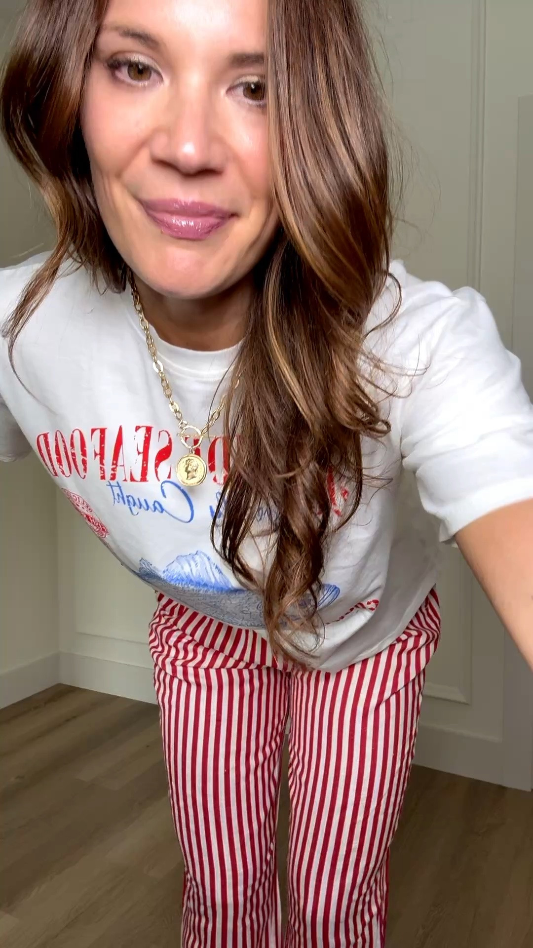 This graphic tee is such a fun summer find. I love the relaxed oversized fit, and the coastal vibe makes it so cute with striped pants, denim shorts, or thrown over a swimsuit.

Graphic tee outfit, coastal style outfit, oversized tee, casual summer look, beach town style, relaxed everyday outfit, striped pants outfit, comfy casual fashion, summer graphic tee, easy throw on outfit, vacation style, casual chic outfit, laid back summer style, Stang and Co

#LTKmomlife #LTKSeasonal #LTKTall