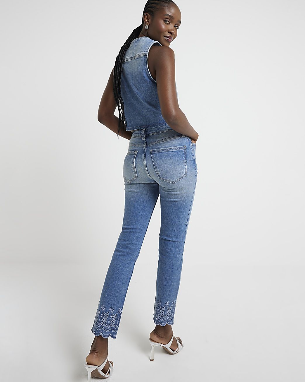 Blue high waisted broderie slim jeans | River Island (UK & IE)