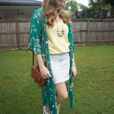 Yellow tee and green floral duster with my little denim skirt 💚💛 with the green and yellow added a neutral bag, this little Rebecca Minkoff MAB camera bag.

#LTKaustralia