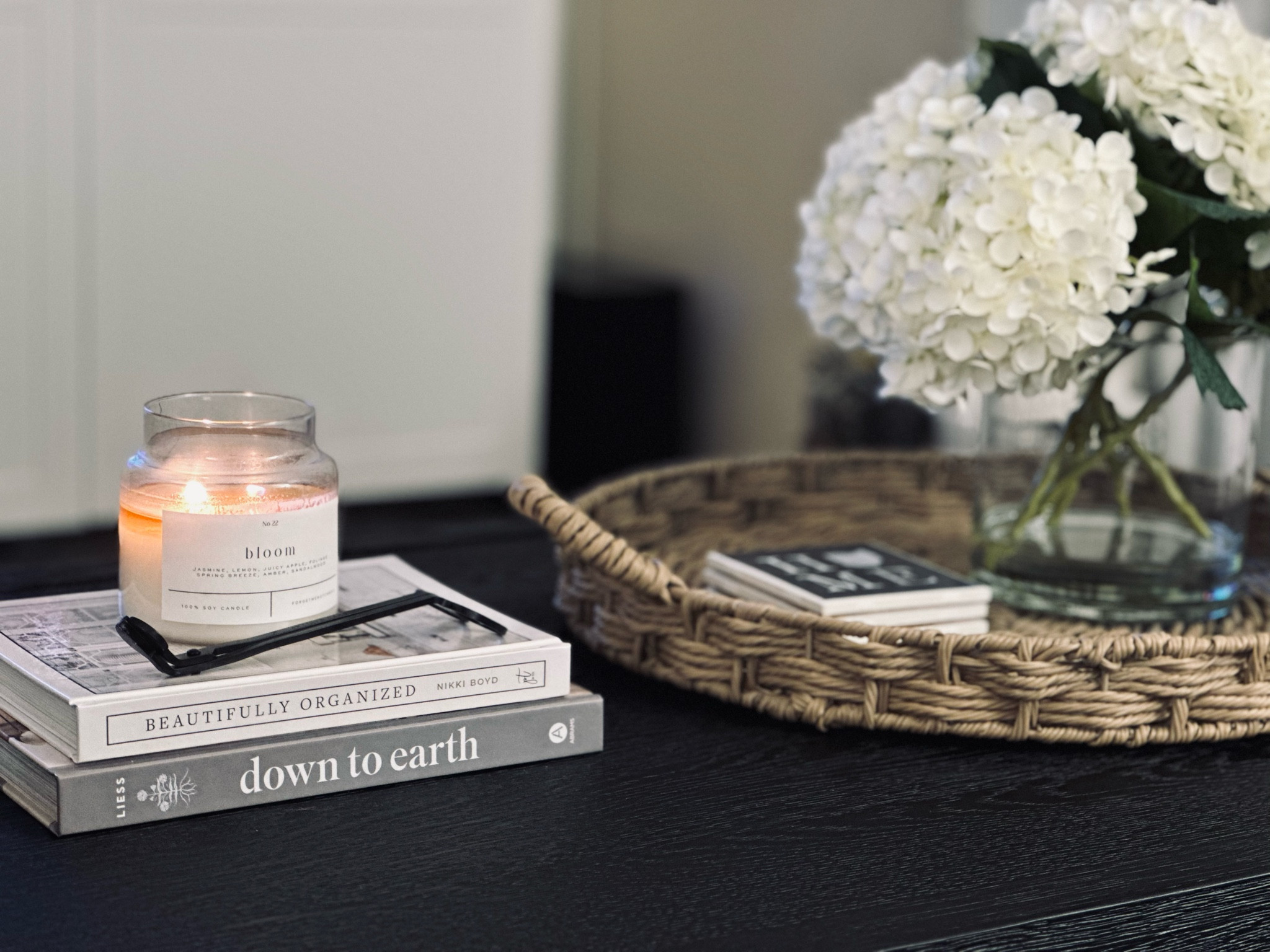 Coffee table decor, coffee table styling, hydrangeas, tray, coffee table books, forget me not candle, black coffee table 

#LTKSpringSale #LTKSeasonal #LTKhome