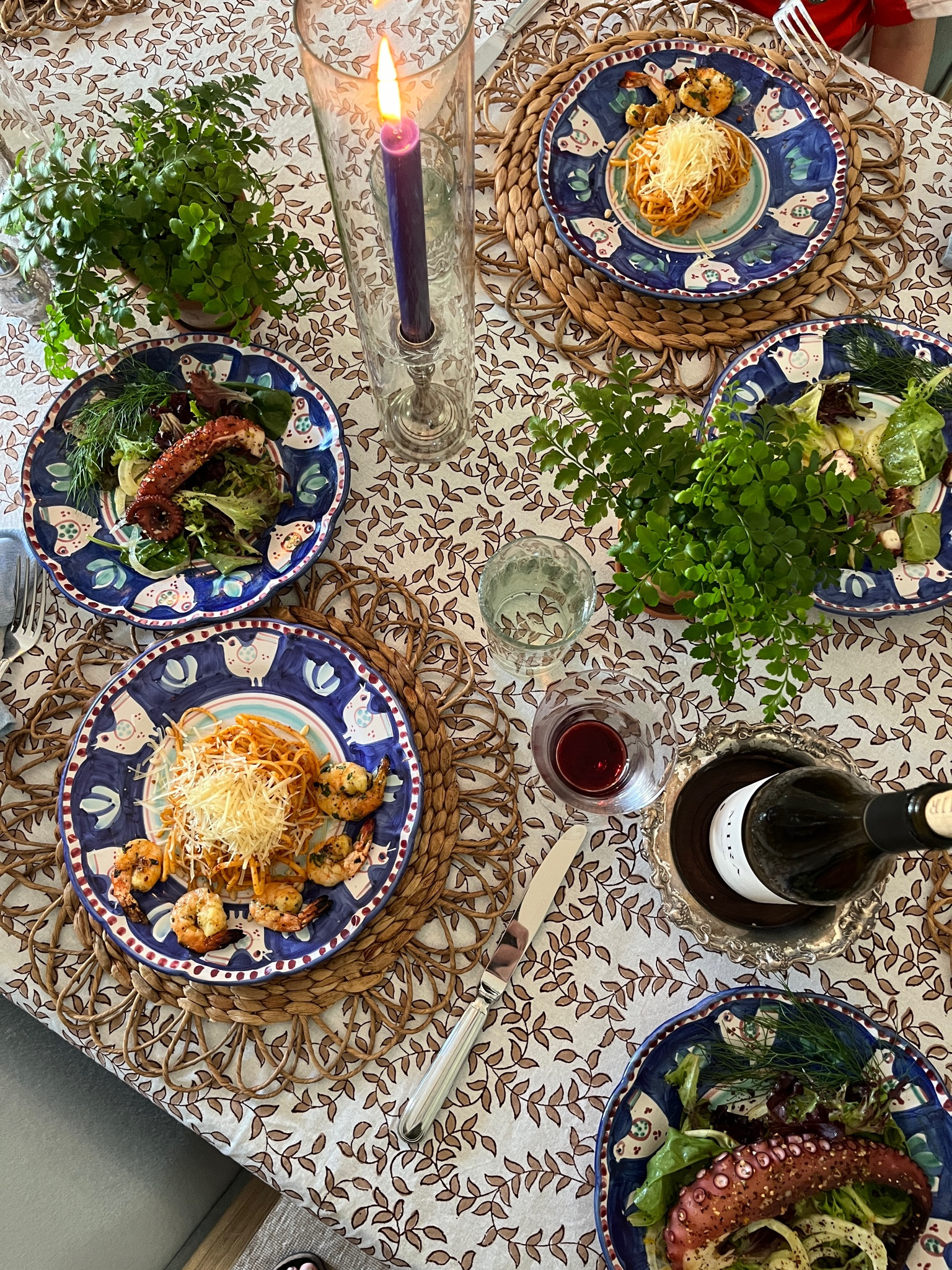 A neutral tablecloth sets the stage perfectly for rattan placemats, colorful ceramic dinnerware, and potted greenery. To be clear, the cooking was not done by me! 

#LTKParties #LTKHome #LTKFamily