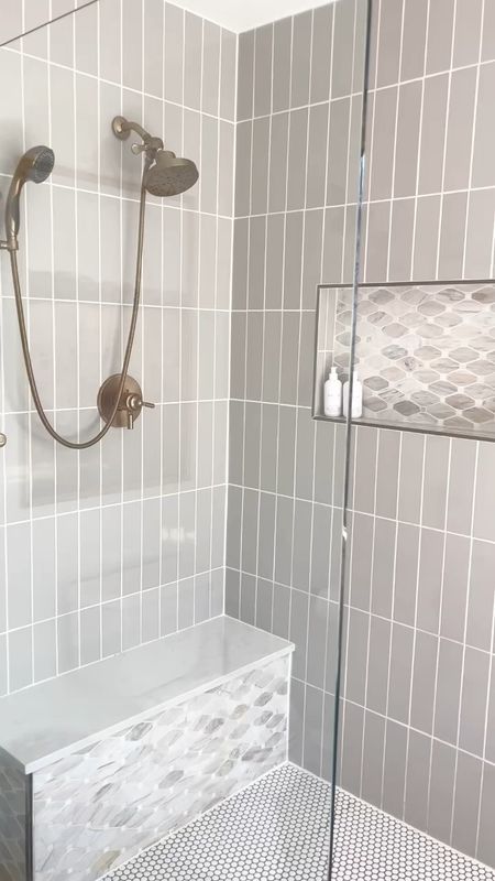 In my latest blog post, I share all the intricate details that went into our primary bathroom renovation. During the stages of the renovation that I shared in my Instagram stories, my most asked question was, why no shower door? I answer this question in the post, but I’ll spare you the search and answer it here too 🤪. 

To save on costs. This house is our temporary home, but we made it a home. I didn’t get exactly what I wanted but the before and after makes such a difference that it’s simply enough for us to enjoy while we’re still here. 

Having a shower glass panel vs. a shower door saved us roughly $2,500 for a custom door (our shower is larger than the standard size). We selected a 50in wide shower glass panel from @homedepot and had it installed by our favorite contractor @u1st_home_improvementllc. The panel is simple, sleek and elegant giving off a European vibe and it’s easy to clean. 

My husband initially hesitated about choosing a shower panel over a shower door. The contractor and I put in a lot of effort to persuade him that this was the best option to save costs to also expand the shower in size. Now, neither of us mind not having a door. With proper floor leveling by the contractor, the water will always flow down to the drain instead of pooling on the tile and our guy did it right. 

Head to the blog to see all the details that went into this bathroom Reno 🫶🏼 www. mydesignhaven.com

#LTKStyleTip #LTKSaleAlert #LTKHome