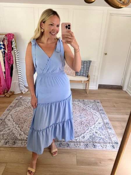 This dress comes in a ton of other colors but I’m loving this pretty blue! There’s a snap closure so it’s not too low cut and the ties are functional! I’m wearing a med  

#LTKStyleTip #LTKSeasonal #LTKMidsize