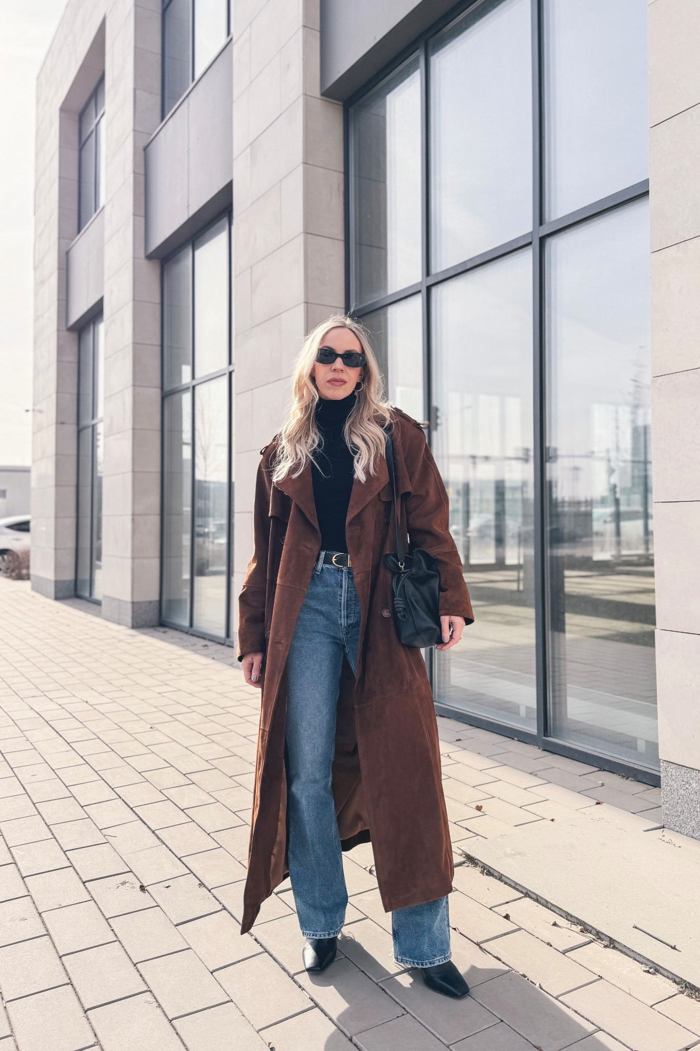 Suede trench coat, bootcut jeans, CBK minimal style, brown and black outfit, spring look 

#LTKOver40 #LTKspringtrends #LTKspring