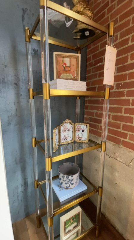 Oscarine Lucite Narrow Mirrored Bookshelf from Anthropologie! ✨ 

• Girly glam style
• Gold, acrylic, glass
• Open shelves for displaying

#LTKSaleAlert #LTKVideo #LTKHome