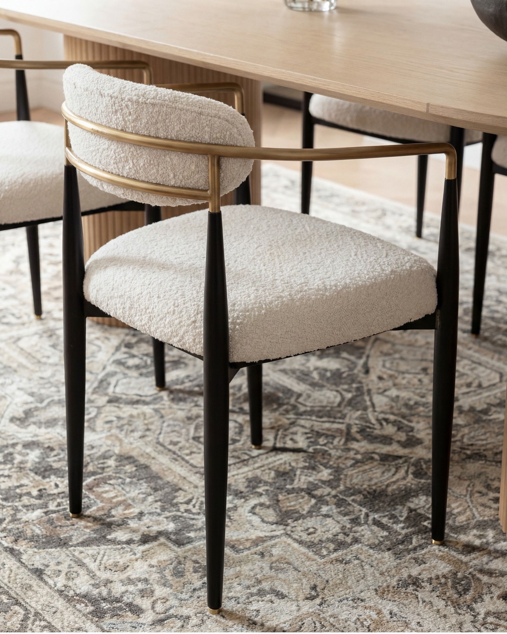 ✨ Shop the look:
Light oak oval dining table | Ivory boucle dining chairs | Brass and glass ribbed pendants | Vintage taupe and ivory rug | Blonde wood sideboard | Matte black vase | Neutral floral arrangement | Gold-framed wall art | Black metal window frames | Ceramic decor accents

#LTKhome #LTKsale #LTKstyletip