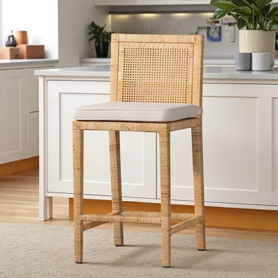 Malina a modern and contemporary counter stool made of wood and rattan with a natural finish | Wayfair North America