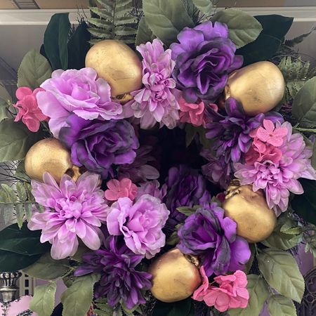 Hit the right mix of spooky and enchanting in your Halloween décor with this gorgeous wreath from Ashland. A stunning arrangement of purple and pink roses and mums interspersed with grinning gold skulls, let this piece bring haunting charm to your front door as you celebrate the tricks and treats of the season.

Details:
Gold, pink, purple and green
24" x 24" x 6 (60.9cm x 60.9cm x 15.24cm)
Polyester, foam, twig and PVC
Recommended for indoor and covered outdoor use only

#LTKHalloween #LTKfamily #LTKsalealert