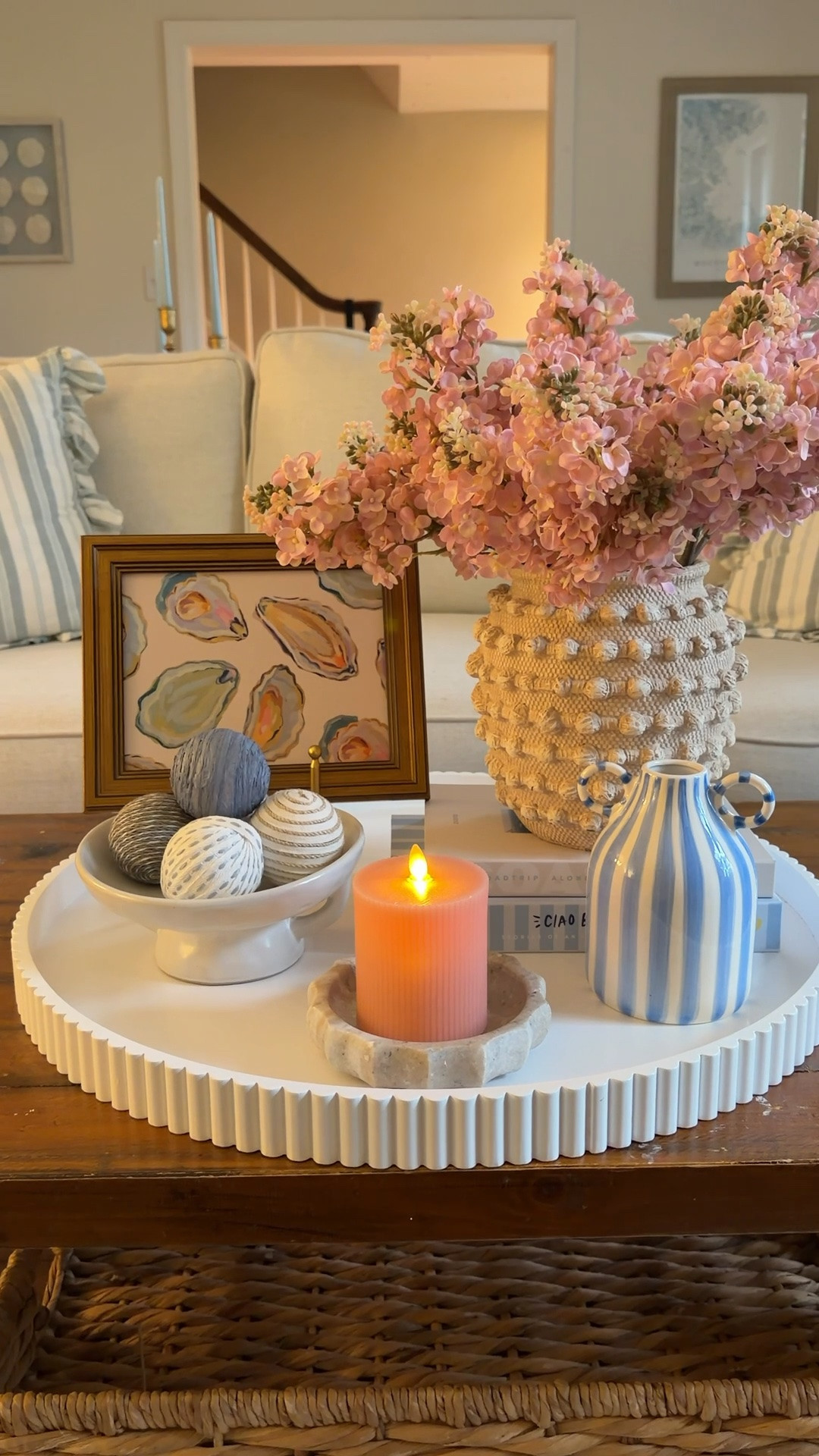 This framed oyster print perfectly encapsulates my coastal vibe this summer and it’s only $15! I paired it with some other summer faves, including these new ornamental books, and striped blue vase.

#LTKSeasonal #LTKHome