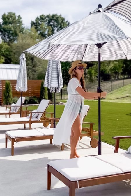 Pool and patio favorites! White swim suit cover up dress Sun hat ray ban cats 5000 sunglasses summer beach and travel favorites. Umbrella and heavy umbrella stand outdoor furniture lounge chairs poolside loungers white dress summer dress swim maternity Nashville outfit 

#LTKswim #LTKhome #LTKSeasonal