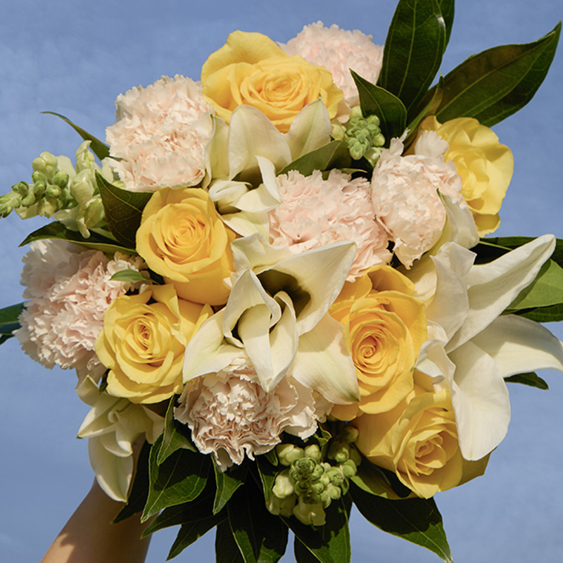 Yellow Roses With White Lilies and Peach Carnations. - The Bouqs Co. | The Bouqs Co.