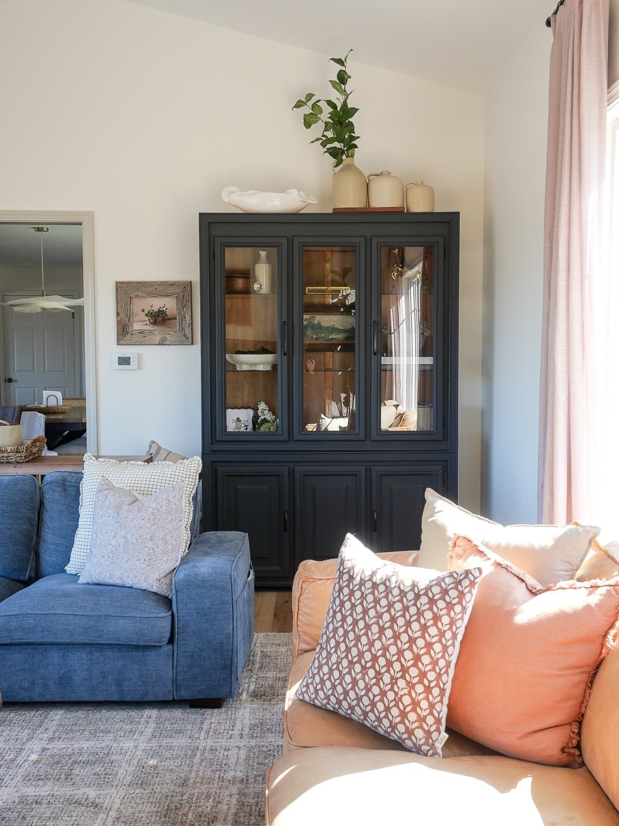 The living room is cozy for spring. Some easy floral pillows paired with a vibrant color palette make a neutral living room easy to give a quick home refresh  

#LTKSaleAlert #LTKFindsUnder50 #LTKHome