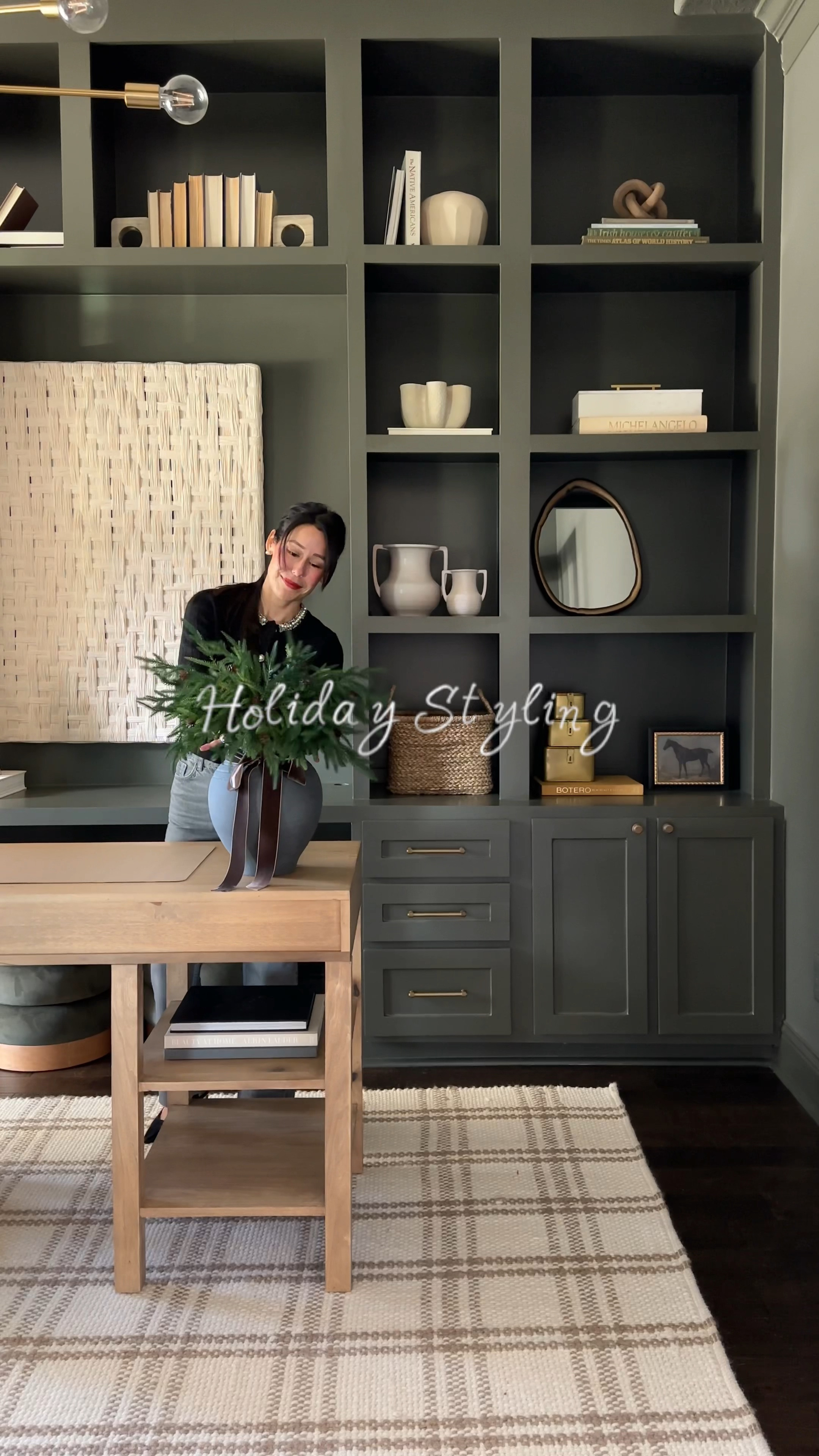 Even my office gets holiday cheer!! Styling my office for the holidays. From garland around the mirror, to pine stems, my pottery barn gold reindeer, and new crate and barrel snowmen and ornaments I used in a bowl. It’s all linked here including my rug, and Walmart accent table and swivel chair! 

#LTKHoliday #LTKHome #LTKWatchNow