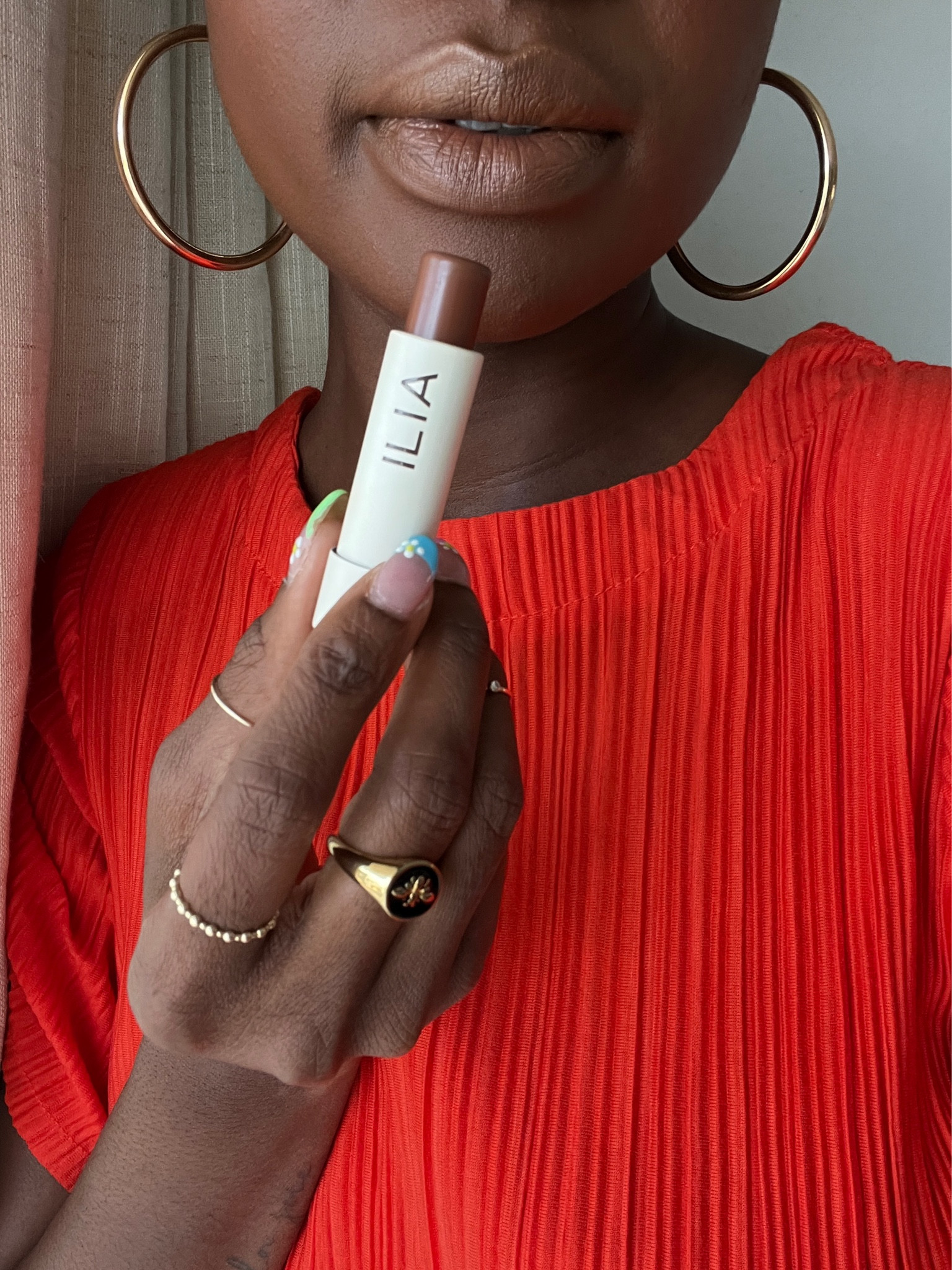 Natural lip color by Ilia. This shade is called faded. It’s a tinted lip balm. My favorite gold hoops from Jenny Bird and red crinkle shirt by scoop from Walmart  

#LTKbeauty #LTKworkwear #LTKunder50