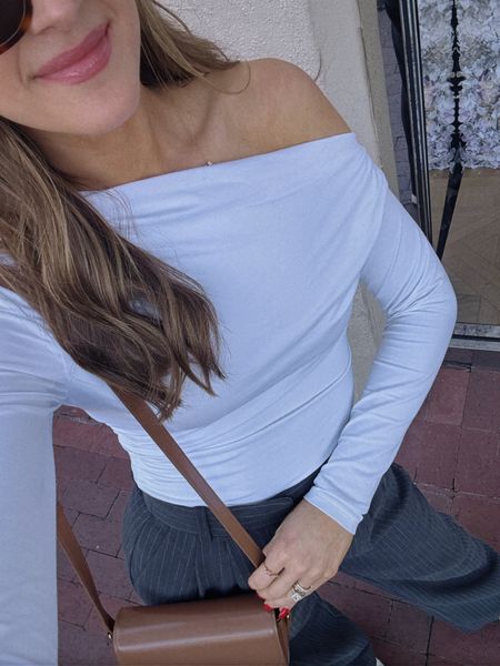 This bodysuit is a new fav & perfect for spring. It comes in a few colors & is a great closet staple. I am wearing a size S in the bodysuit & 25 in the trousers. // spring outfits, spring wardrobe, spring date night outfit, trouser outfit, spring style