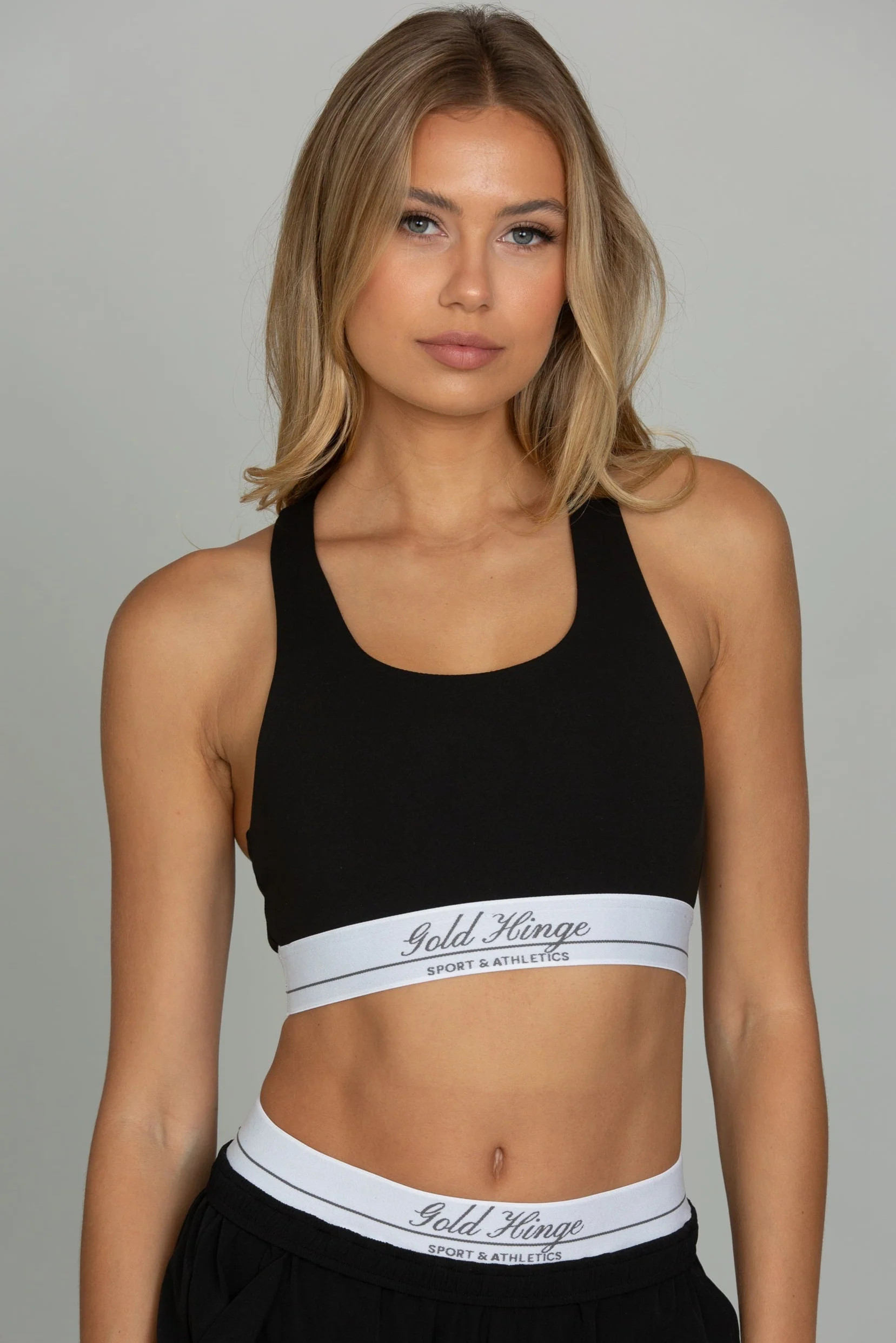 Black MotionCloud Sport Bra | Gold Hinge