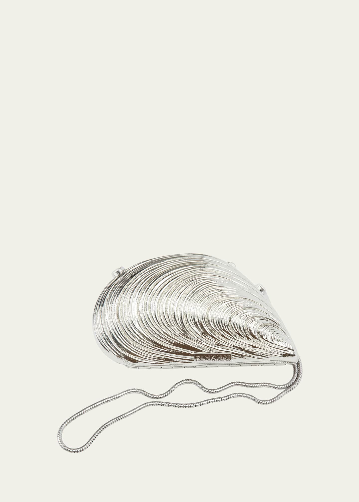 SIMKHAI Bridget Mini Metal Oyster Shell Clutch Bag | Bergdorf Goodman