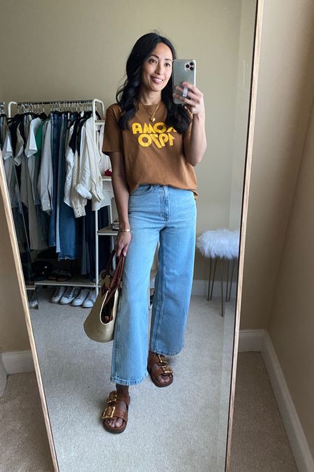 Jeans. Spring outfit. Summer outfit. Graphic t-shirt true to size. Size up in wide leg jeans. Tote bag also from @sezane. Slide sandals  

#LTKOver40 #LTKItBag #LTKStyleTip
