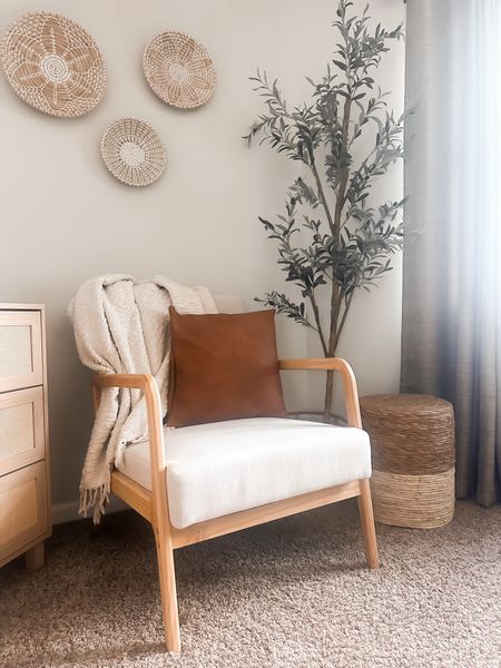Cozy corner in primary bedroom 

Accent chair, pillow covers, ottoman, olive teee, wall baskets, dresser 

#LTKSaleAlert #LTKHome #LTKStyleTip
