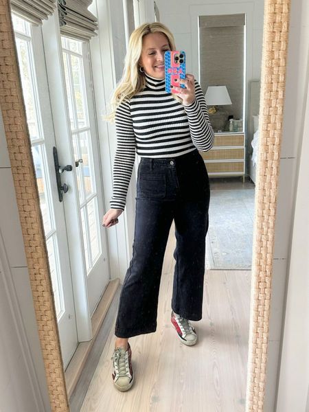 Give me all the black and white stripes for fall. Wearing size small in this turtleneck. I would size up! Under $30! Jeans are a size 26 and code FANCY10 will get you 10% off 

#LTKSeasonal #LTKstyletip #LTKsalealert