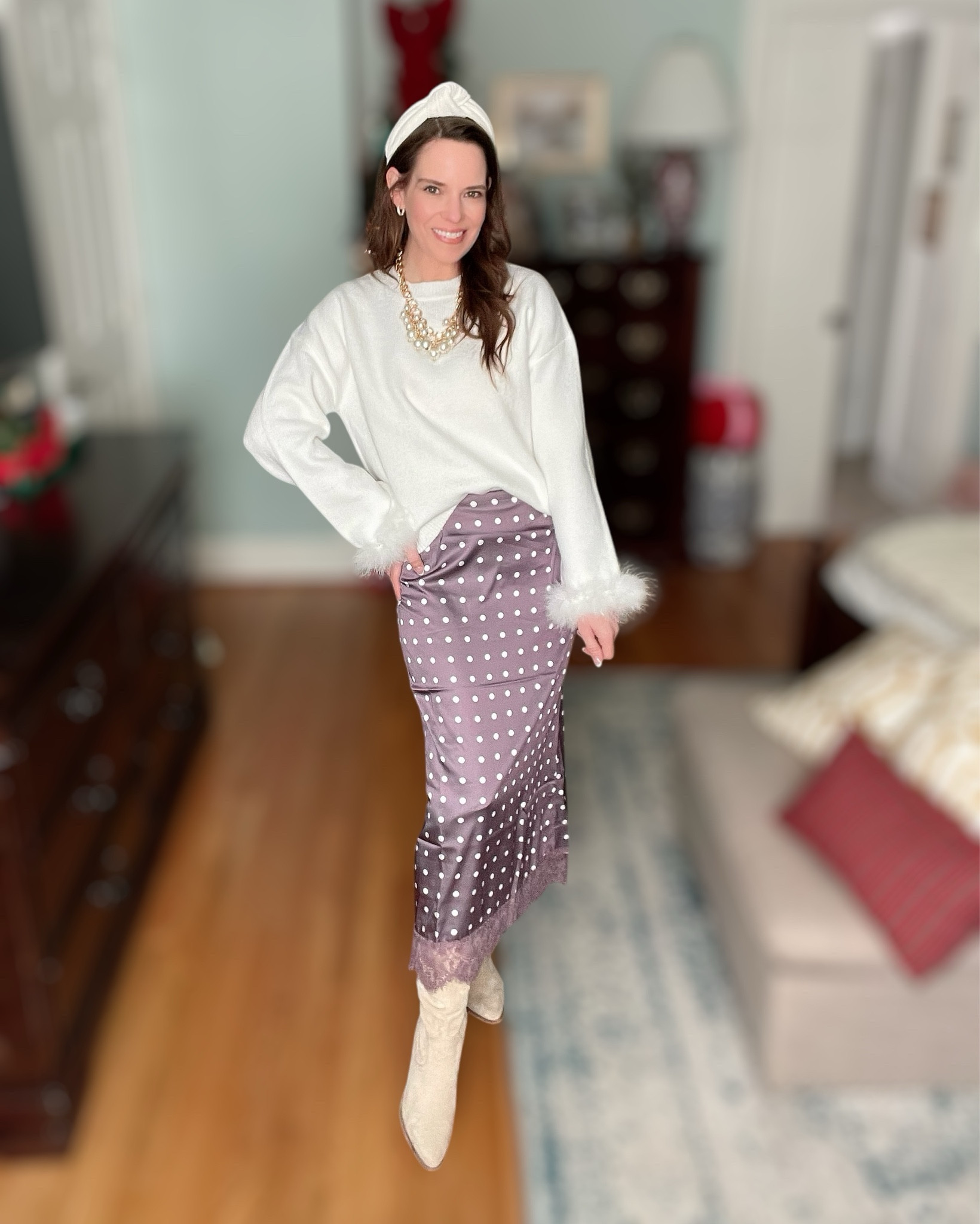 Cozy Glam Winter White Sweater & Satin Skirt Outfit 🤍✨

This look is the perfect mix of cozy and chic — soft winter white paired with a silky, feminine skirt always feels elevated but still wearable 🤍 The original sweater is sold out, but I linked a very similar option with the same relaxed fit and luxe texture so you can easily recreate the look. I love how it balances the sleek satin maxi skirt and gives that effortless, styled-but-not-trying-too-hard vibe.

I finished it with knee-high boots for a polished winter feel and added a statement pearl necklace to dress everything up. My necklace here is Lilly Pulitzer, but I linked several similar pearl and chain styles at different price points that give the same classic, layered look ✨ The headband adds a soft, feminine touch and ties everything together beautifully.

This outfit is perfect for holiday dinners, date nights, church, or anytime you want something comfortable that still feels special 🤍

Winter white outfit, satin skirt outfit, cozy sweater outfit, holiday outfit ideas, pearl statement necklace, Lilly Pulitzer inspired jewelry, knee high boots outfit, feminine winter style, chic casual outfit, affordable winter fashion, polished everyday look

#LTKFindsUnder100 #LTKHoliday #LTKFindsUnder50