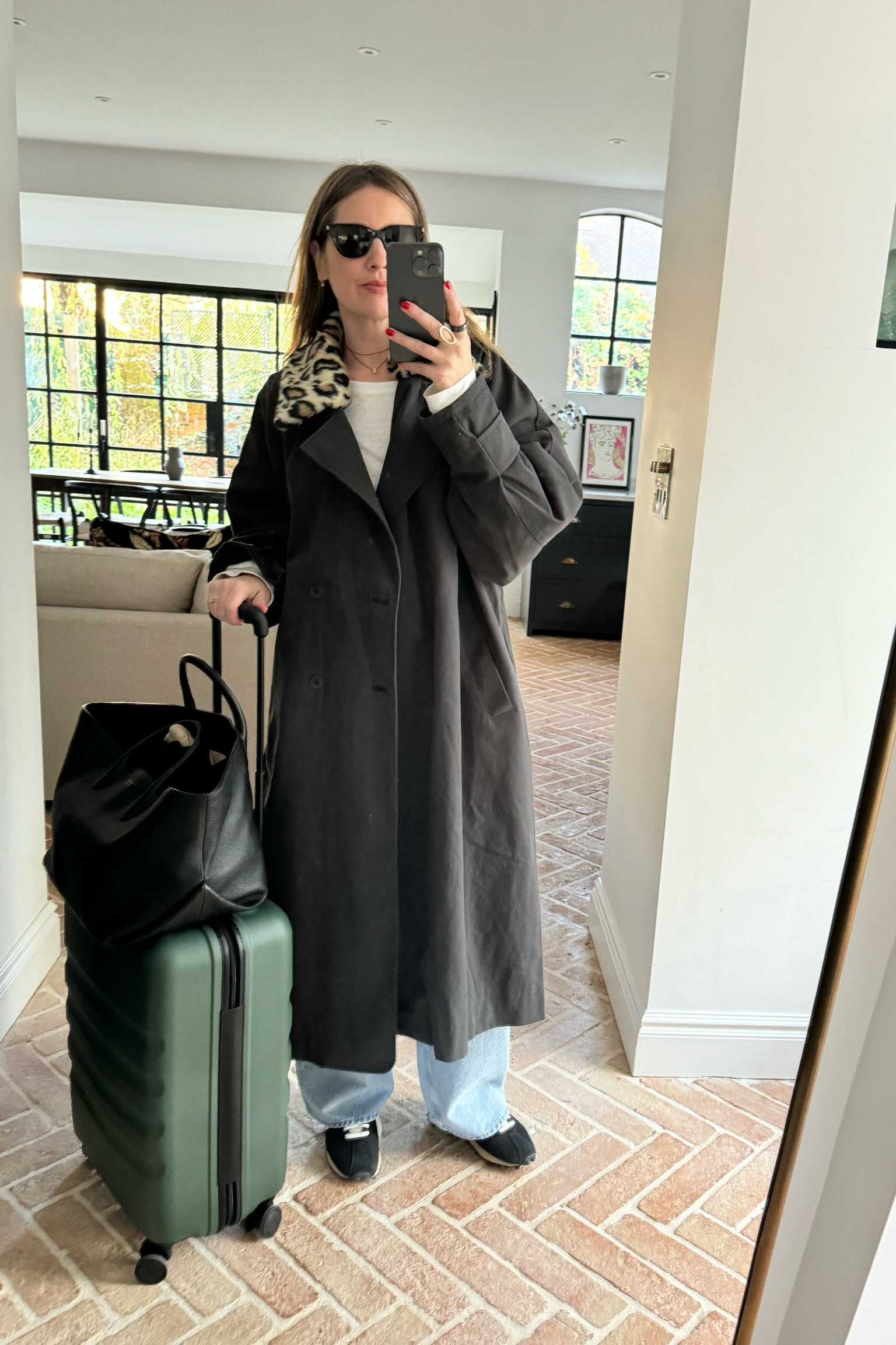 Travelling Outfit | Free People Trench | Leopard Print | Faux Fur 

#LTKstyletip #LTKtravel #LTKeurope