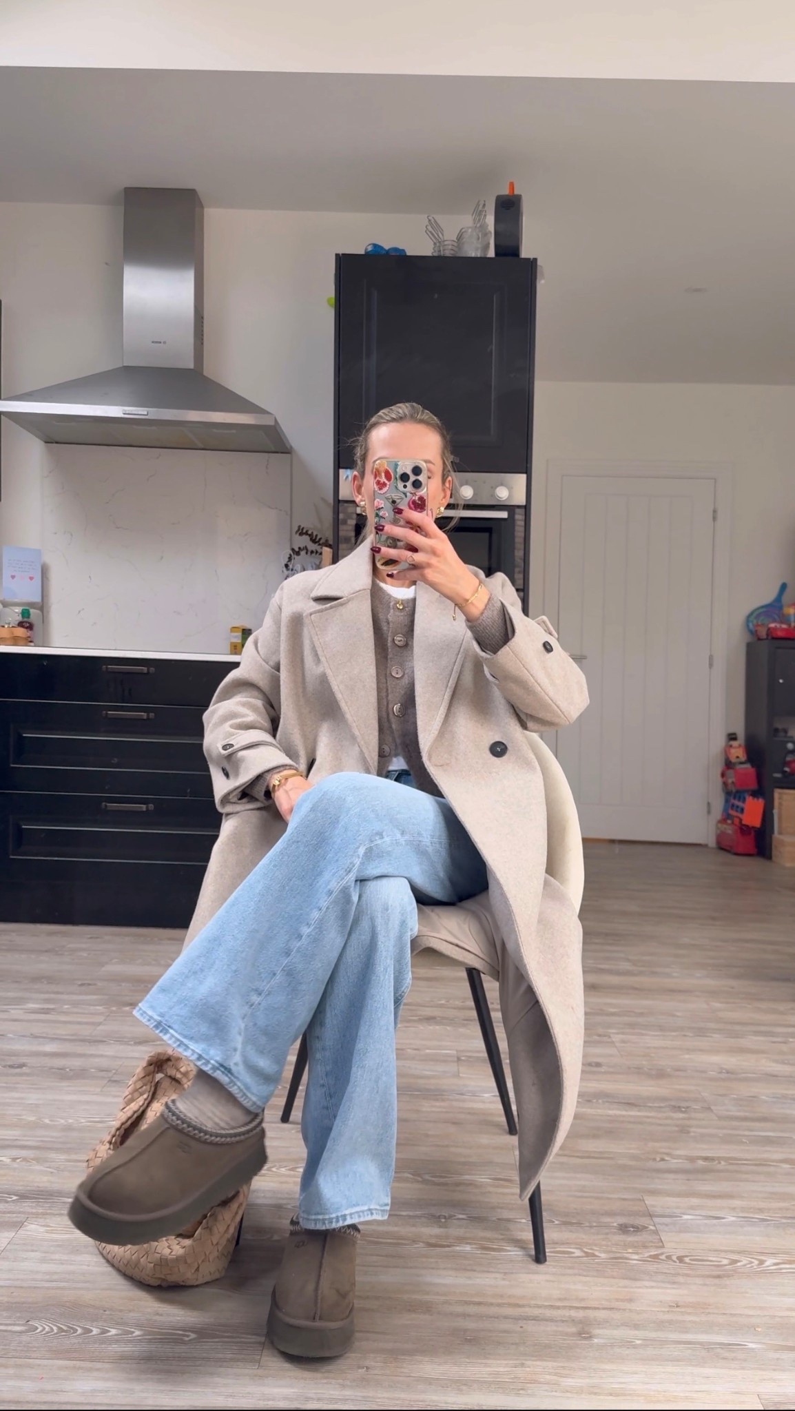 Comfy casual outfit idea for spring. A taupe cardigan, blue wide leg jeans , uggs and a neutral coat. Love a cardigan layered with a tee too 

#LTKspring #LTKuk #LTKstyletip