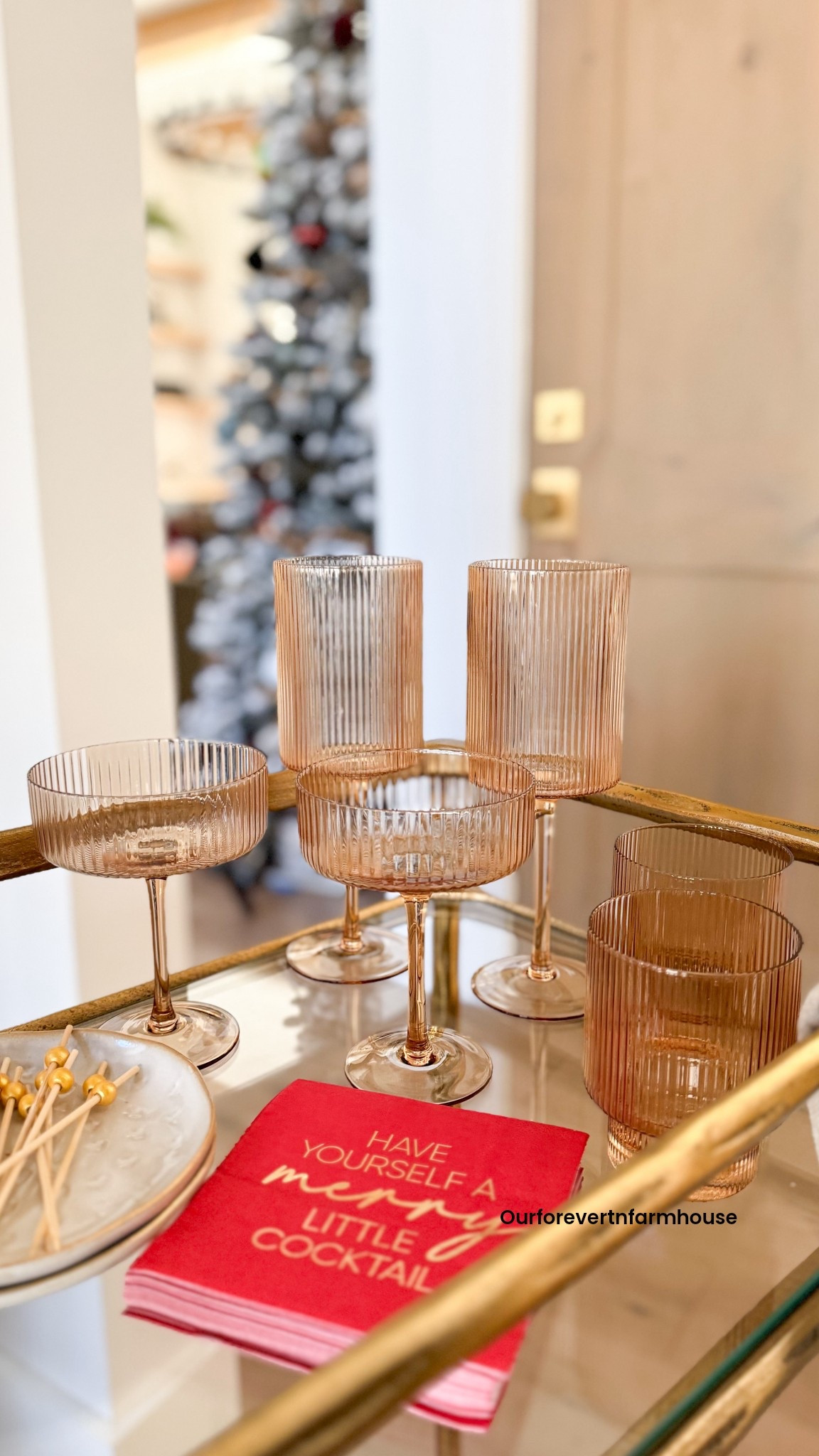 Holiday hosting starts with a cute bar cart moment… and this one is fully stocked with my favorites from Linen & Clove. Glasses, small plates, a gold tray, cocktail cherries + syrup, even the little tinsel wreath for sparkle. Now all that’s missing is the first pour. 🍒✨

#holidayhosting #christmasbarcart #barcartstyling #ltkhome #ltkholiday #linenandclove #holidaydecorideas #christmasdecorinspo #hostessfavorites #drinkstation #holidaycocktails #festivedecor #christmasentertaining #cozystyle #homefortheholidays

#LTKGiftGuide #LTKHoliday #LTKHome