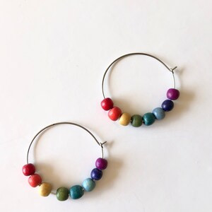 Autumn Rainbow Beaded Hoop Earrings  |  Wooden Seed Bead Neutral Rainbow Earrings on Stainless St... | Etsy (US)