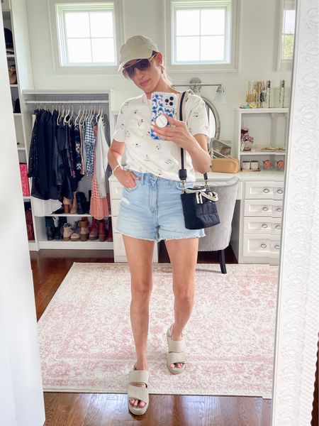 Spring or summer casual outfit with high waisted shorts, target cross body bag, sporty chic outfit, sunglasses, comfy sandals 

#LTKstyletip #LTKunder100 #LTKitbag