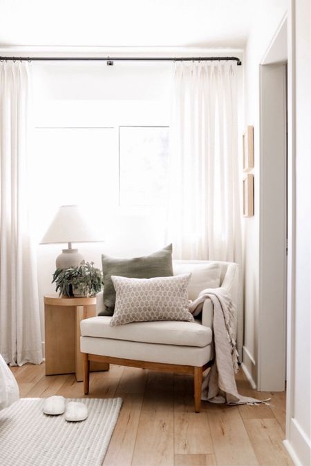 Shop this cozy corner of our bedroom featuring this gorgeous Target chair, Target accent table, designer look for less lamp, and Amazon curtains! 

#guestroom #primary #armchair #sidetable #homedecor 

#LTKhome #LTKsalealert #LTKfindsunder100