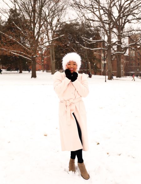 Loving this pink trench coat and fur fat and fur gloves. 

#LTKstyletip #LTKmidsize