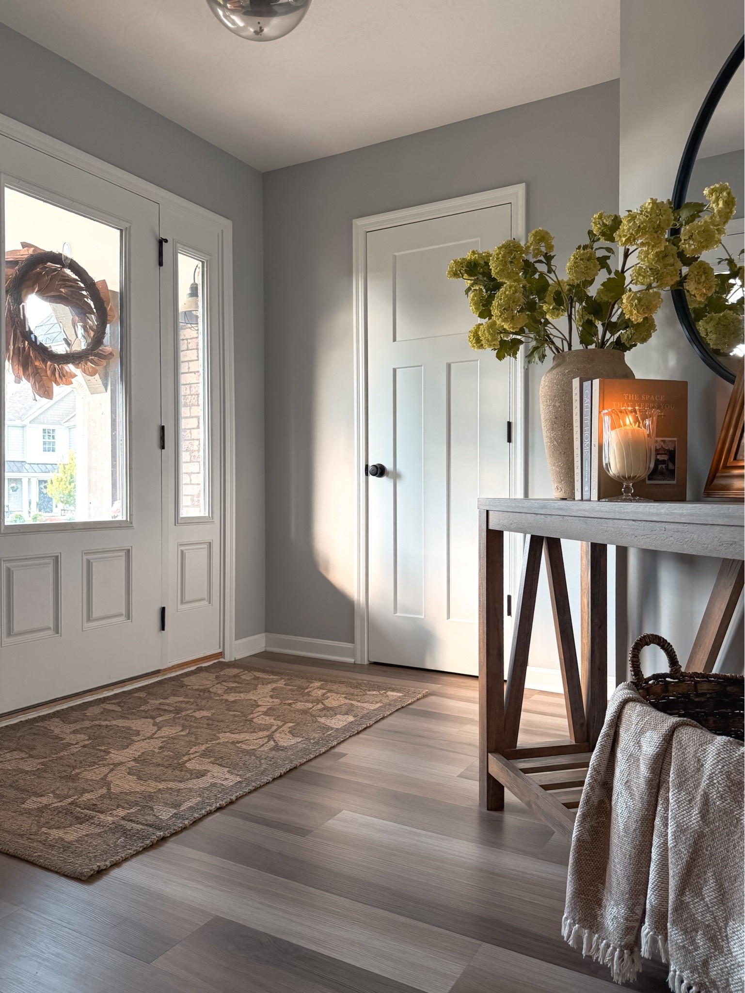 I’ve had my eye on this rug for quite a while, ever since the Rue collection dropped from the #cljxloloi collab.

And I finally made her mine. I think she looks pretty good in here.

Entryway, console styling, home decor, indoor rug, front door, hallway, neutral home, foyer, summer styling, cozy home finds

#LTKHome #LTKSaleAlert