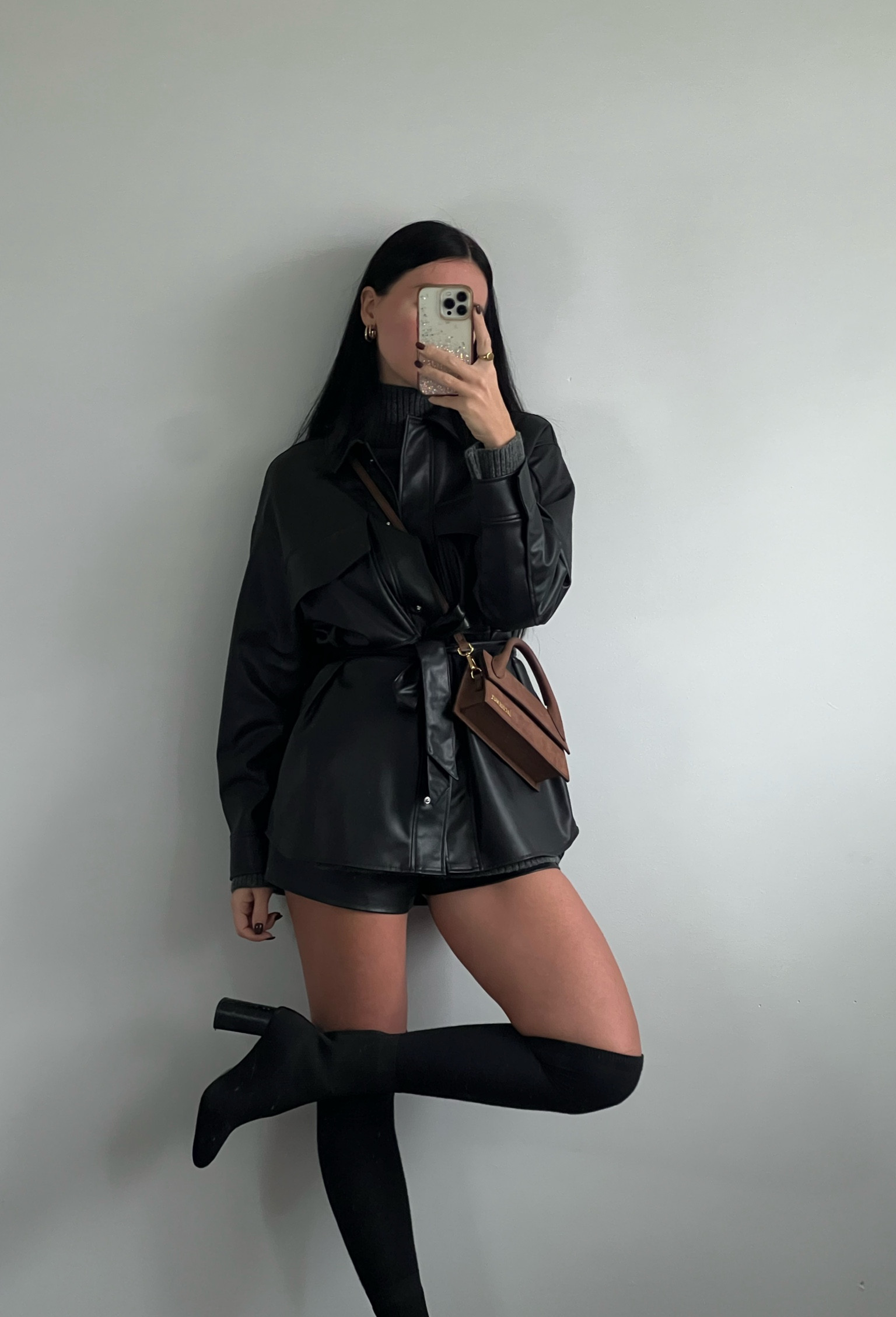 Styling an H&M oversized sweater with Leather over shirt, leather shorts, jacquemus purse and over the knee boots.
#H&M #winteroutfit #allblacklook #overthekneeboots #sweateroutfit 

#LTKstyletip #LTKSeasonal #LTKGiftGuide