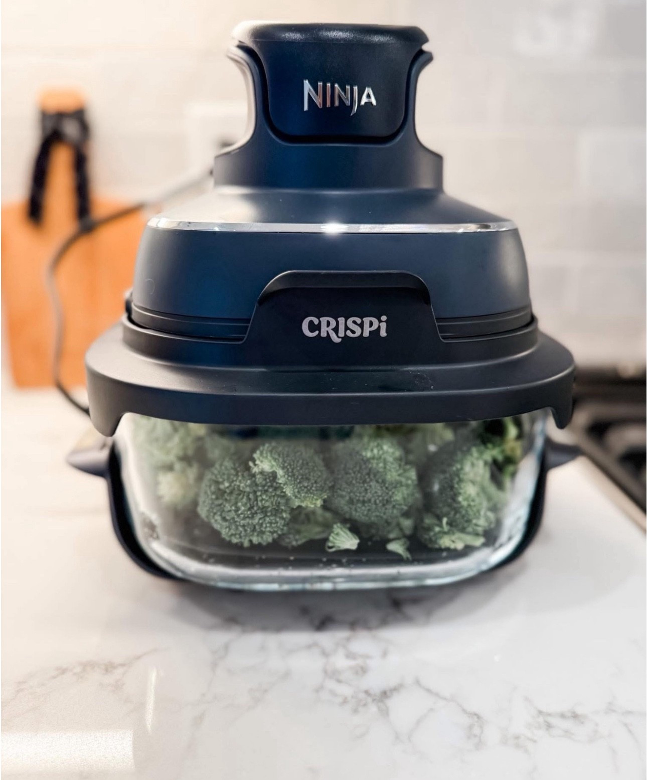This Ninja Crisp is so easy to use! Cooks meals fast and makes veggies super crispy!

#LTKHome