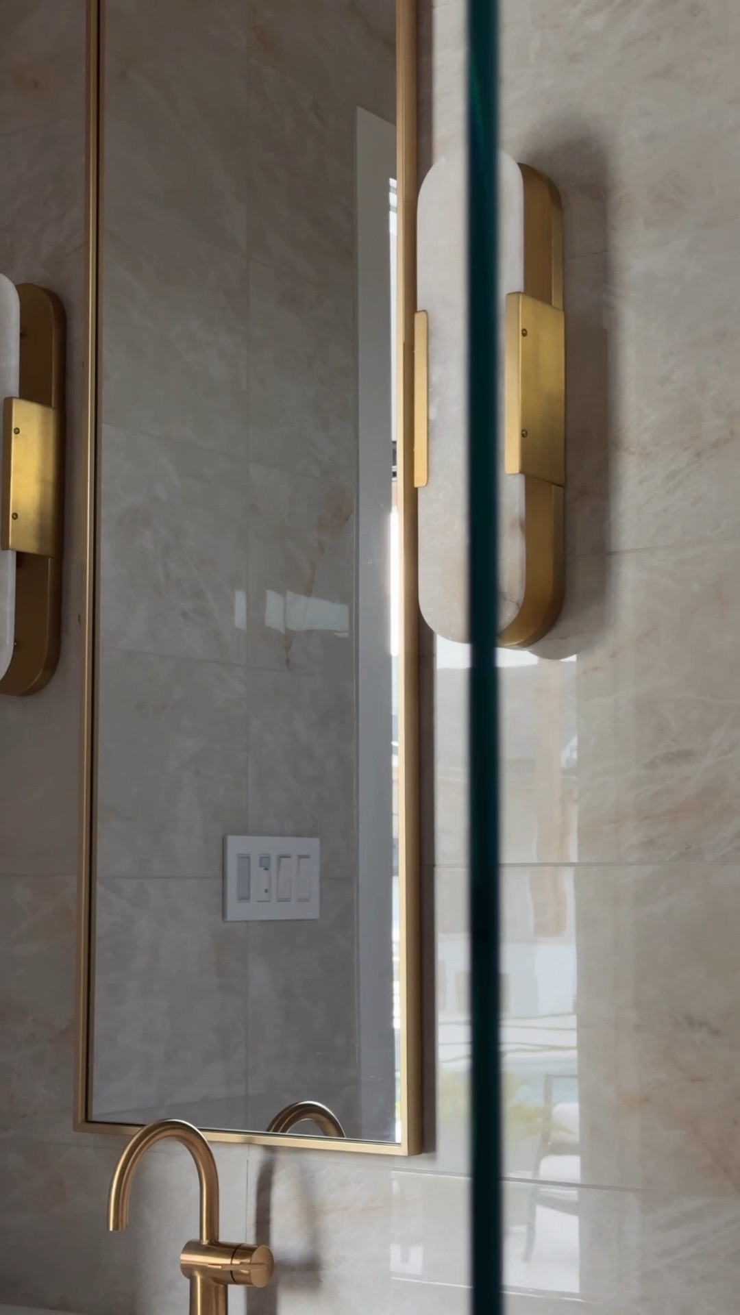 This bathroom started from nothing… completely down to the studs. #ad

I didn’t want to overcomplicate it, just make it feel more elevated and finished. 
Focusing on a few key pieces like the vanity, lighting, and a statement wall in the shower made the biggest difference.

Being able to source everything from Wayfair made it easy to pull the whole space together, and it turned out exactly how we hoped.

@wayfair #Wayfair #WayfairPartner #bathroomremodel #bathroomvanity #bathroomlighting 

#LTKSaleAlert #LTKHome