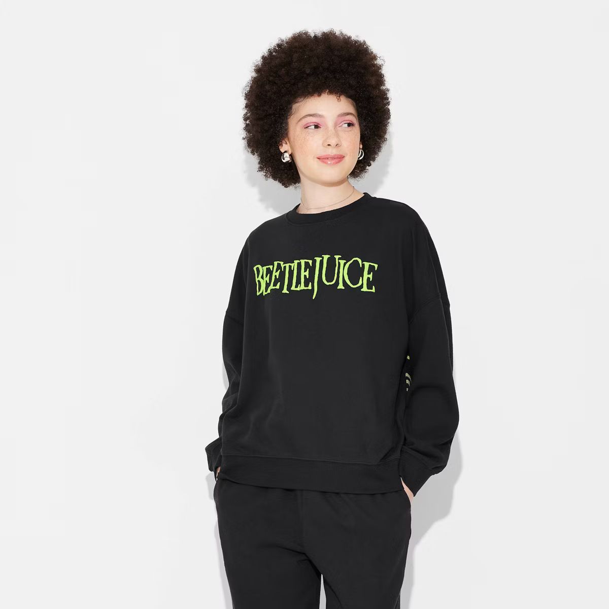 Women's Beetlejuice Graphic Sweatshirt - Black XXS | Target