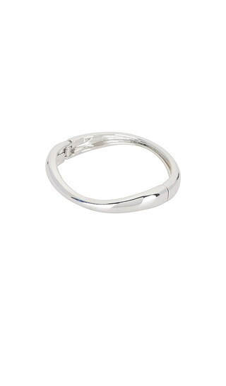 petit moments Lilly Bangle in Metallic Silver. | Revolve Clothing (Global)