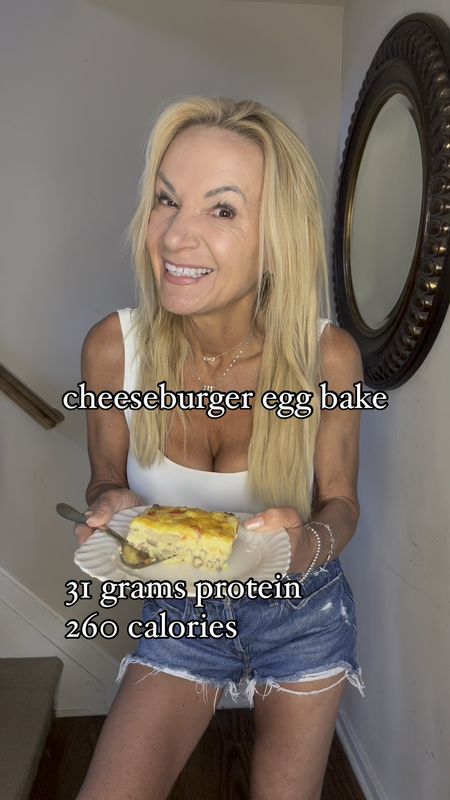CHEESEBURGER EGG BAKE- 31 grams protein, 260 calories 

1/2 yellow or white onion, diced 
1 pound extra lean ground beef 
8 eggs
1 cup 2% cottage cheese 
1 diced Roma tomato
1/2 cup shredded mild cheddar 
salt and pepper 

Preheat oven to 350. Line an 8x8 inch baking pan with parchment. 

Lightly spray a large pan with avocado oil and sauté onion until it starts to soften. Add ground beef, season with salt and pepper and cook until fully done. 

Meanwhile combine eggs and cottage cheese and blend until completely smooth. 

When beef is cooked spread evenly over the bottom of baking dish and pour egg mixture over it. Top with diced tomato and shredded cheddar and additional salt and pepper. 

Bake at 350 for 35 minutes or until lightly browned and set in the center. Cut into 6 pieces. Tastes great hot or cold!

Are you going to try this?

xoxo
Elizabeth





#LTKhome #LTKover40 #LTKVideo