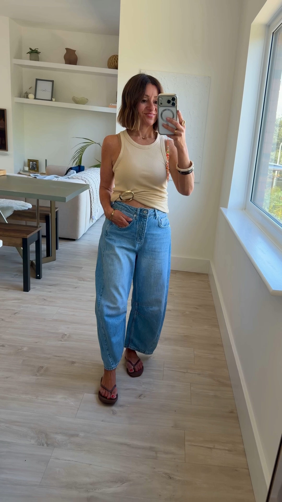 THE jeans are back on! Size down on the waist. I’m 5ft 1 for reference. The jeans are cropped. 

Wearing the comfiest brown flip flops in my usual size. 

The vest is old but I’ve found similar.

#LTKuk #LTKsummer #LTKjeans