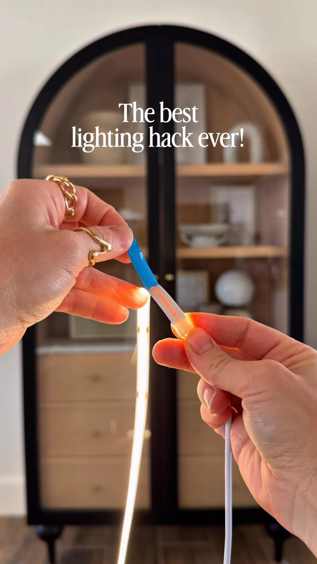 Added peel-and-stick LED strip lights inside my arched cabinet and it completely changed the look. This is one of my favorite easy home upgrades because the lights have adhesive backing so you can stick them right inside cabinets, shelves, or bookcases for that custom built-in glow. Such an easy way to elevate a cabinet and make styling pieces feel more intentional.

Cabinet lighting, LED strip lights, peel and stick lighting, cabinet glow lighting, DIY cabinet lighting, arched cabinet styling, built in cabinet look, cozy home lighting, modern cottage decor, shelf lighting, under cabinet lighting, home decor lighting ideas

#LTKHome