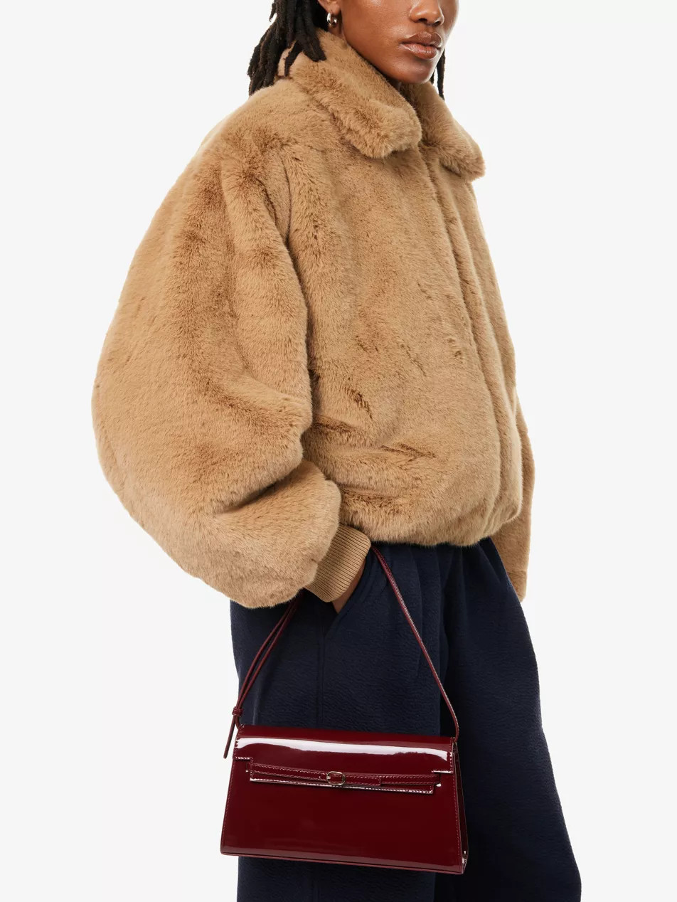 Belted patent-leather shoulder bag | Selfridges