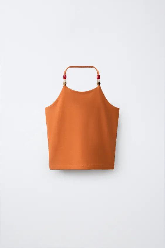 Sleeveless halter neck top with beaded detailing on the neckline. | Zara UK
